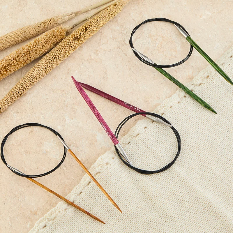 several circular needles in different colours