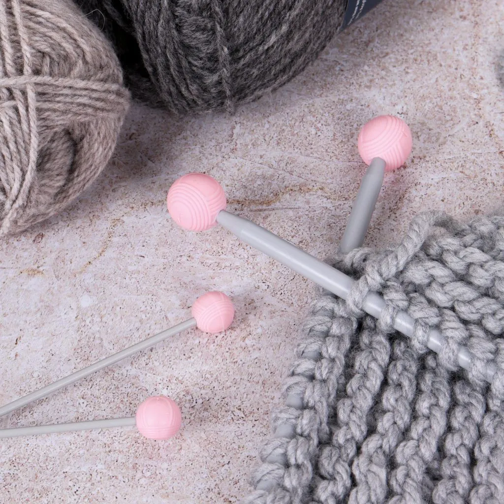 a knitting needles and yarn ball point ptotectors